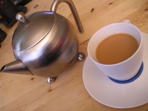 Чашка чая с молоком Чашка чая с молоком